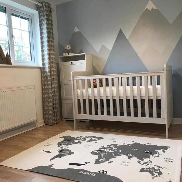 Adventure themed baby store nursery