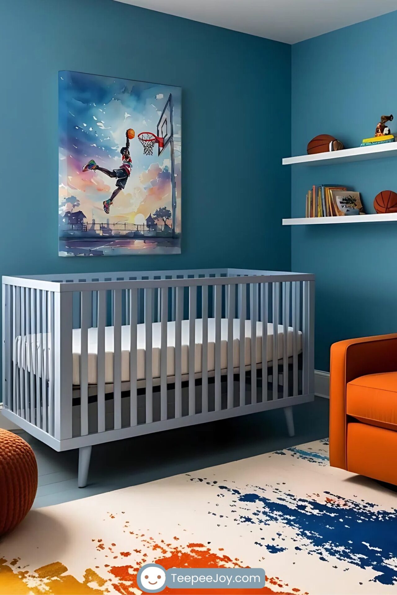 Vibrant, basketball-themed nursery featuring a gray crib against a deep blue wall. Above the crib hangs a dynamic wall art piece of a basketball player soaring through the air for a dunk, set against a colorful sunset backdrop. Floating shelves display books, basketballs, and a small figurine, while an orange armchair and a multicolored abstract rug add energy and warmth to the space.