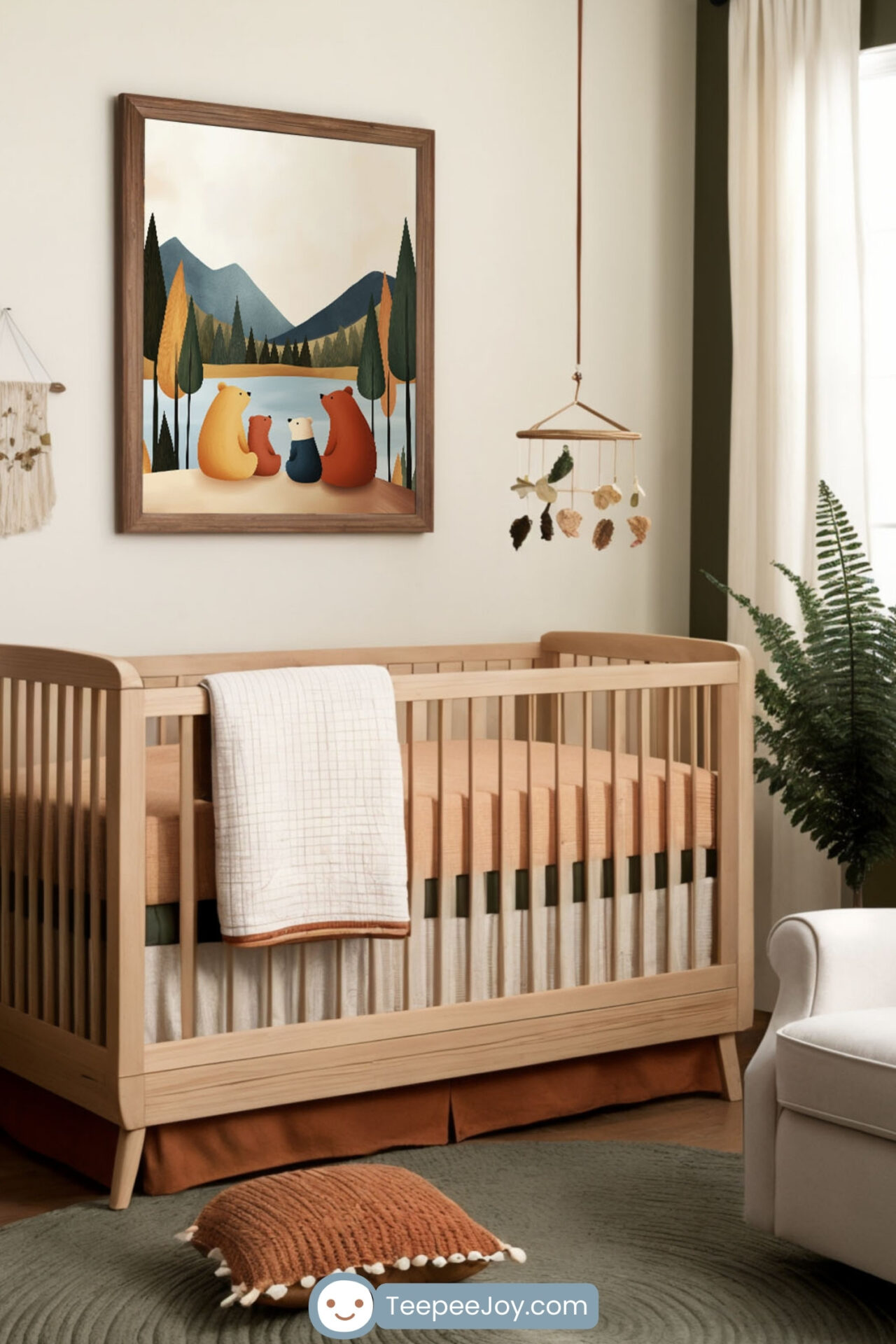Nature-inspired nursery featuring a light wood crib with earthy-toned bedding, set against a two-tone wall with soft cream and deep green. A framed illustration of a bear family by a lake hangs above the crib, complementing the woodland theme. A cozy white armchair with a rust-colored pillow sits beside a large potted fern, while a round green rug and woven accents enhance the organic feel. Wooden furniture, a macrame wall hanging, and a delicate leaf mobile add warmth and texture to the space.