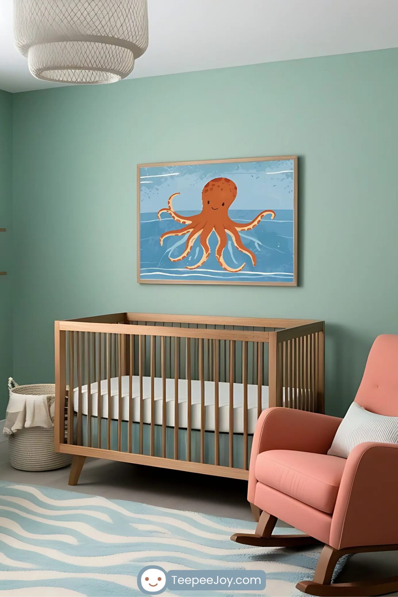 Playful ocean-themed nursery with a wooden crib against a soft teal wall, featuring a framed artwork of a smiling orange octopus floating in blue waters. A coral-colored rocking chair sits nearby, complementing the warm and cool tones of the room. A wavy-patterned rug and woven storage basket enhance the coastal-inspired decor.